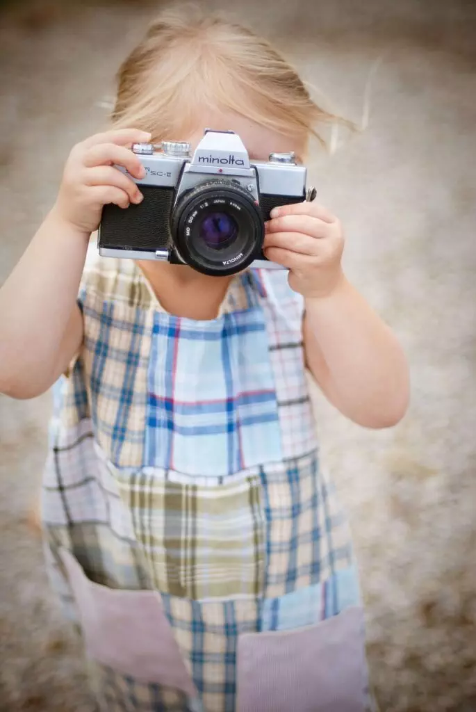 Child taking a photo